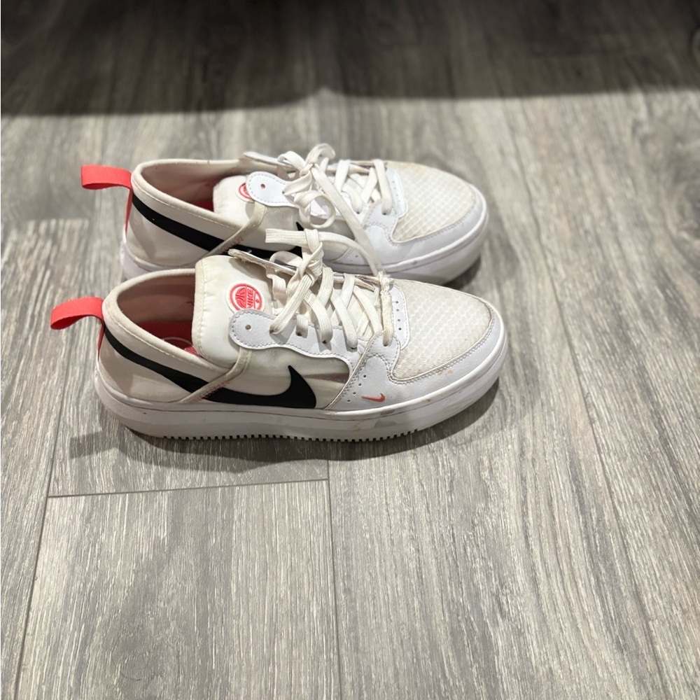 Womans White and Black Nike Sneakers